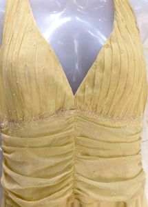 16J6. Chic Yellow V-Neck Ruched Mini Dress