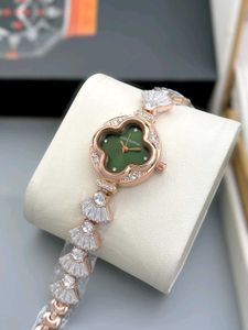 louis vuitton diamond studded ladies watch