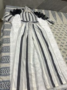 Chic Striped Jumpsuit with Unique Sleeves