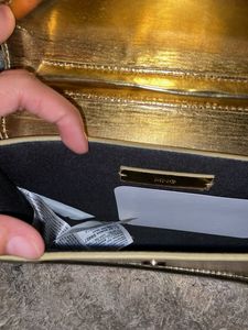 MANGO Gold sling Bag