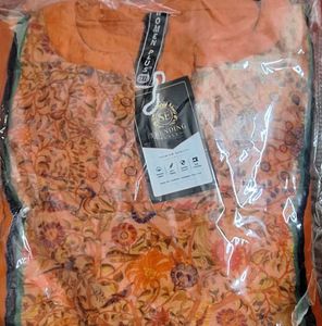 Vibrant Orange Kurta with Peacock Embroidery