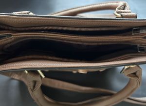 Stylish Taupe Handbag with Perforated Design