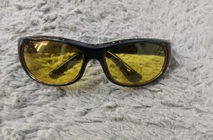 Stylish Black Sunglasses with Yellow Lenses