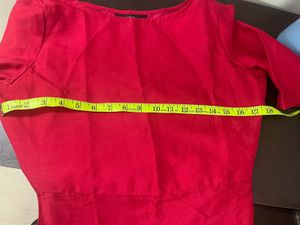 Bright red long kurti by the brand Indya in S size