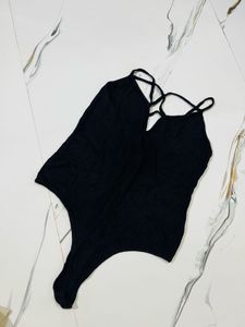 Black Ribbed Criss-Cross Bodysuit