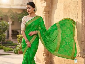 Vibrant Green Saree with Intricate Gold Motifs