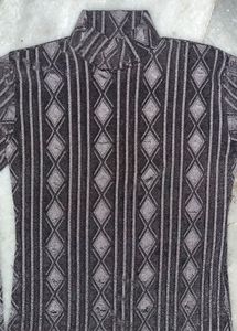 See through Patterned Turtleneck Top