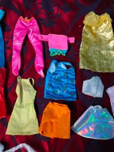 new and old Barbie dolls cloth lot