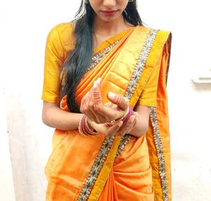 Vibrant Orange Silk Saree with Embellished Border