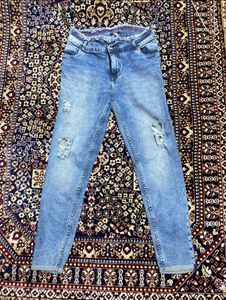 Ripped High-Waisted Jeans