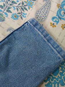 Light Wash Distressed Denim Jeans