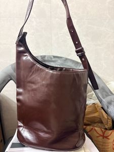Chic Brown Leather Shoulder Bag with Silver Studs