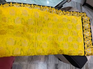 Elegant Yellow Saree with Intricate Border
