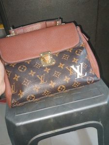 louis vuitton first copy sling bag
