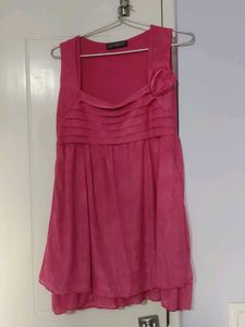 Chic Pink Sleeveless Top with Floral Accent