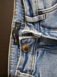 Ripped Light Wash Denim Jeans