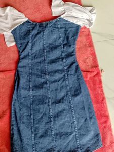 a bodycon denim dress