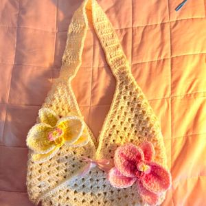 Handmade Crochet Bag with Floral Embellishments