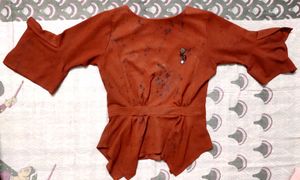 Unique Rust Peplum Top