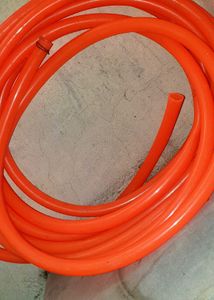 Durable Orange Hose for Various Uses