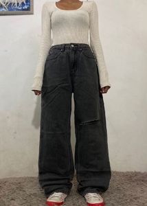 grey ripped jeans