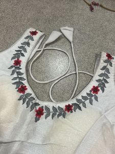 Embroidered White Sleeveless Blouse