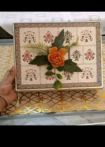 13. Decorative Gift Box with Floral Accent