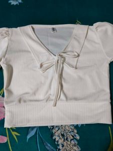 Chic White Ribbed V-Neck Tie Top