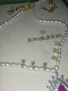 Elegant Pearl Necklace with Ruby Pendant