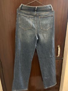 Distressed Blue Denim Jeans