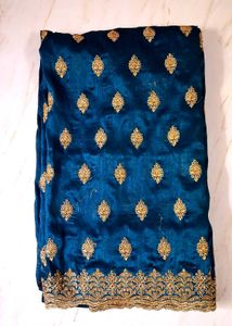 Elegant Teal Saree with Gold Embroidery