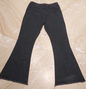 URBANIC HEAVY DISTRESSED BOOTCUT BLACK JEANS