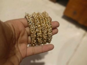 Elegant Pearl & Gold Bangles Set