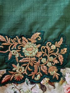 Elegant Green Saree with Floral Border