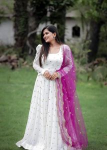 stylish fancy white gown with pink dupptta