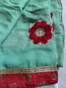 Elegant Mint Green Embroidered Saree