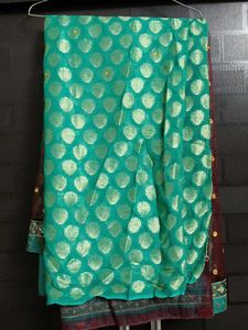 Elegant Teal Saree with Embellishments