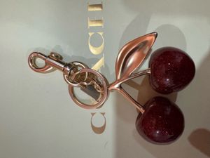 Coach Cherry charm