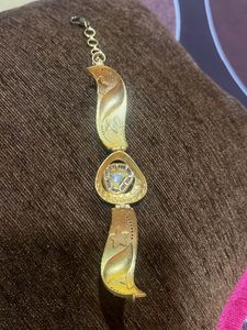 Elegant Gold Bracelet with Stones