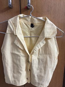 Pale Yellow Sleeveless Collared Top