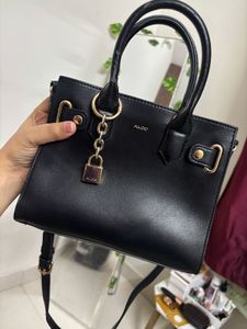 Chic Black Aldo Handbag with Lock Detail