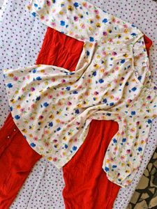 Floral top with Red Dhoti Pants