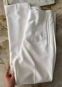 Elegant Women's Almond White High waist Trousers.