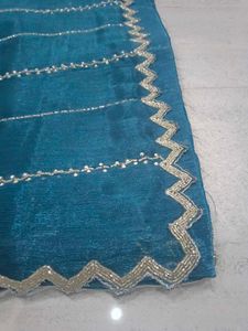 Elegant Teal Saree with Silver Border