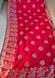 Vibrant Pink Saree with Peacock Motifs