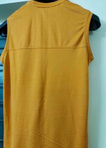 Orange Sleeveless Top with Graphic Print