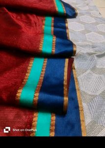 Maroon Saree With Sleevless Blouse