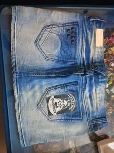 Distressed Denim Mini Skirt