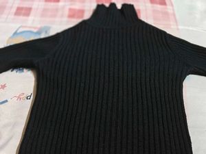 Black Ribbed Turtleneck Sweater