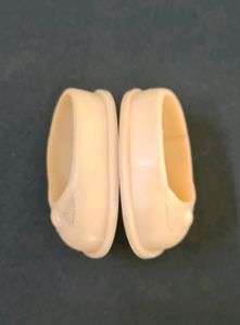 Off white shoes of a Doll from 1960s